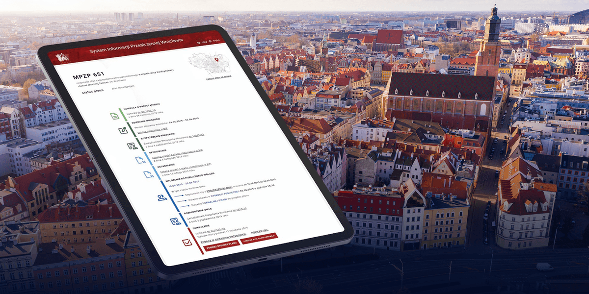 Geoportal po modernizacji. Na zdjęciu tablet ze stroną startową portalu oraz panorama Wrocławia