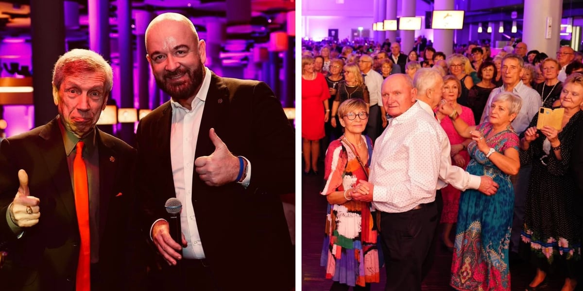 Z lewej strony stoją: Jerzy Skoczylas i Jacek Sutryk. Z prawej strony kobiety i mężczyźni na balu