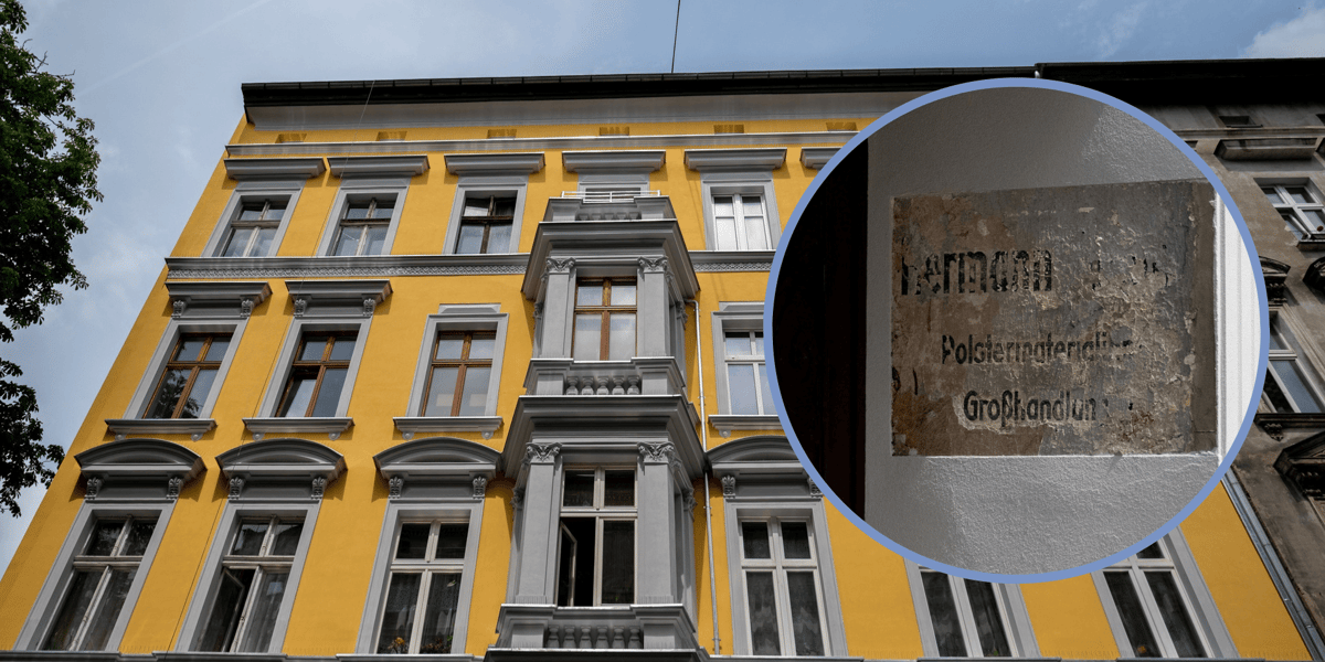 Na zdjęciu wyremontowana kamienica nr 19, w kółku odkryte podczas remontu napisy