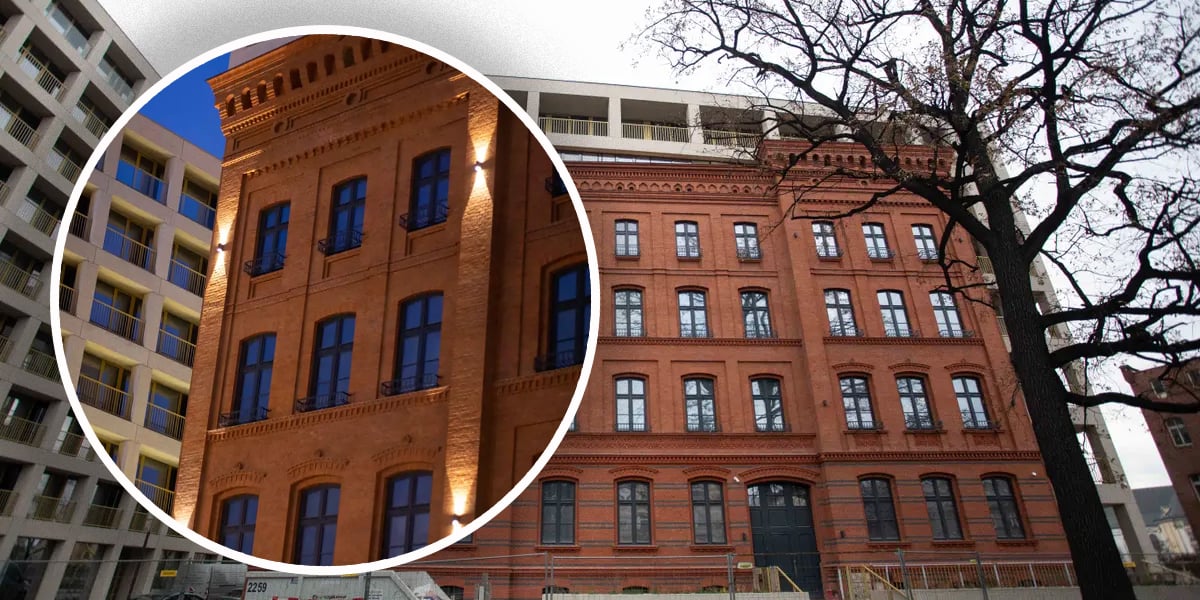 Nowa inwestycja mieszkaniowa powstająca na Nadodrzu, widać jej zabytkową elewację obudowaną nową architekturą, w kółku zaznaczony detal ściany frontowej