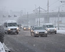 Na zdjęciach ulice we Wrocławiu w śniegu, 21.01.2023 r.