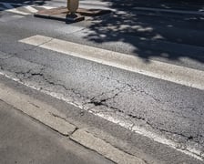 Ulica Dembowskiego i jej zniszczona nawierzchnia przed remontem, 27 sierpnia 2026