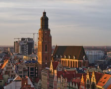 Panorama Wrocławia o zachodzie słońca z mostku Pokutnic