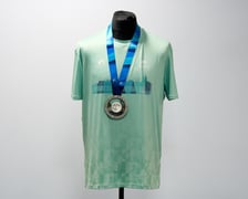 <p>Koszulka i medal</p>