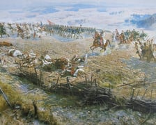 <p>Fragment Panoramy Racławickiej &ndash; generał Tadeusz Kościuszko wskazuje kierunek natarcia drugiej kolumnie odwodu kosynierskiego.</p>
