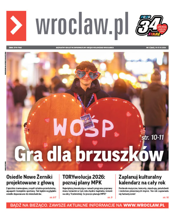 Zdjecie okładki biuletynu - Chłopiec w okularach-sercach trzymający wielkie serce z napisem WOŚP