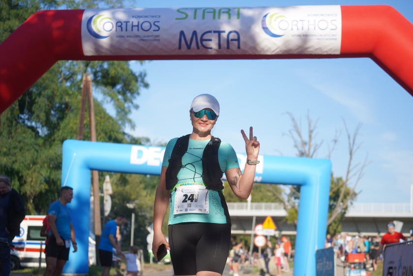 Biegacze i kibice na Orthos H2O Wrocław Półmaratonie
