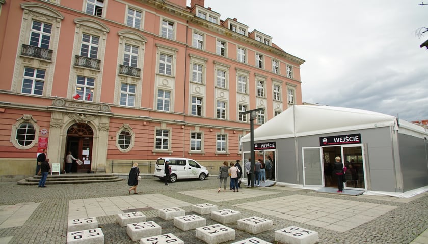 Heated tents for people waiting in front of offices