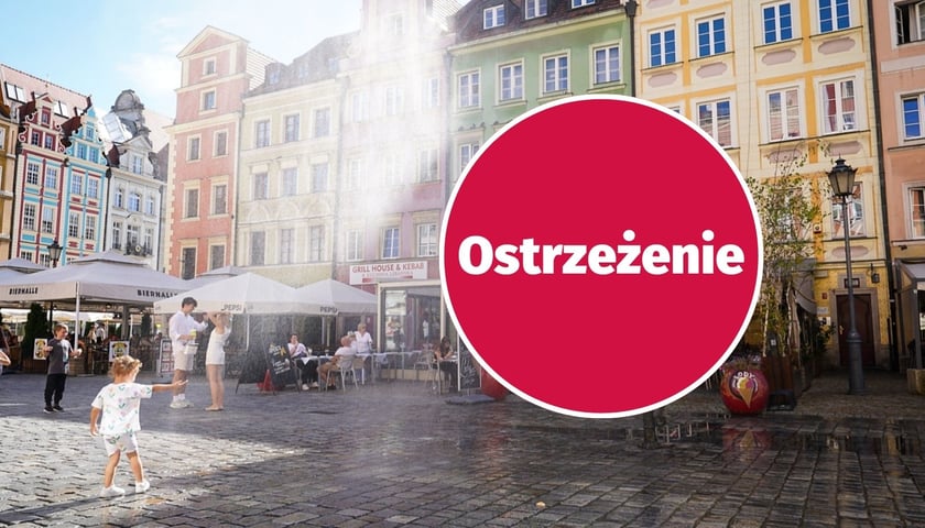 Kurtyny wodne w rynku we Wrocławiu, napis ostrzeżenie