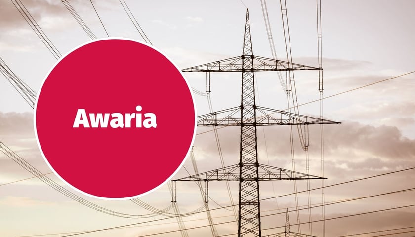 zdjęcie ilustracyjne: napis awaria w czerwonym kółku; w tle sieć energetyczna