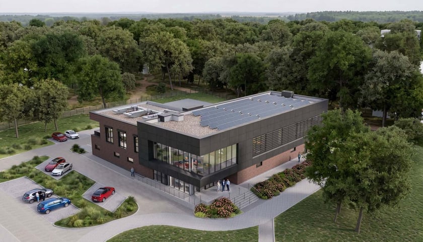 Wizualizacja nowoczesnego budynku zaplecza szatniowo-sanitarnego na stadionie sportowym Zakrzów we Wrocławiu
