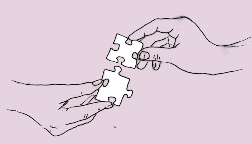 Rysunek przedstawia dwie dłonie z puzzlami, grafika ilustracyjna.