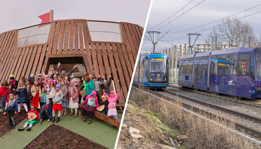 Dzieci bawiące się na nowym placu zabaw Średniowieczny Wrocław w parku Tysiąclecia i jadące po torowisku tramwaje