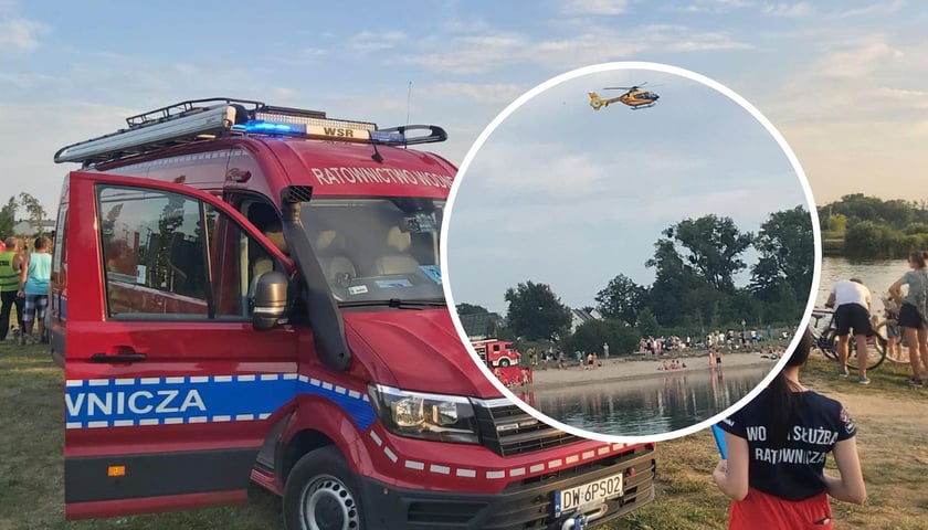 Wóz Wodnej Służby Ratowniczej, w kółku widać śmigłowiec ratowniczy, akcja ratunkowa na kąpielisku w Siechnicach 