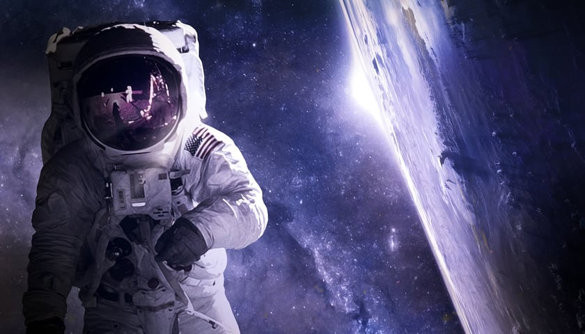 Astronauta w przestrzeni kosmicznej, grafika ilustracyjna