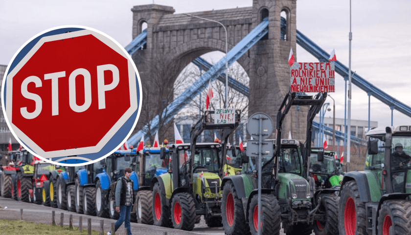 Strajk rolników we Wrocławiu, traktory na tle mostu Grunwaldzkiego (15 lutego 2024). Na zdjęciu w kółku znak "stop"