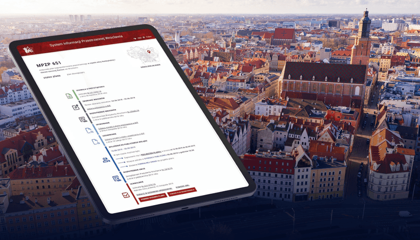 Geoportal po modernizacji. Na zdjęciu tablet ze stroną startową portalu oraz panorama Wrocławia