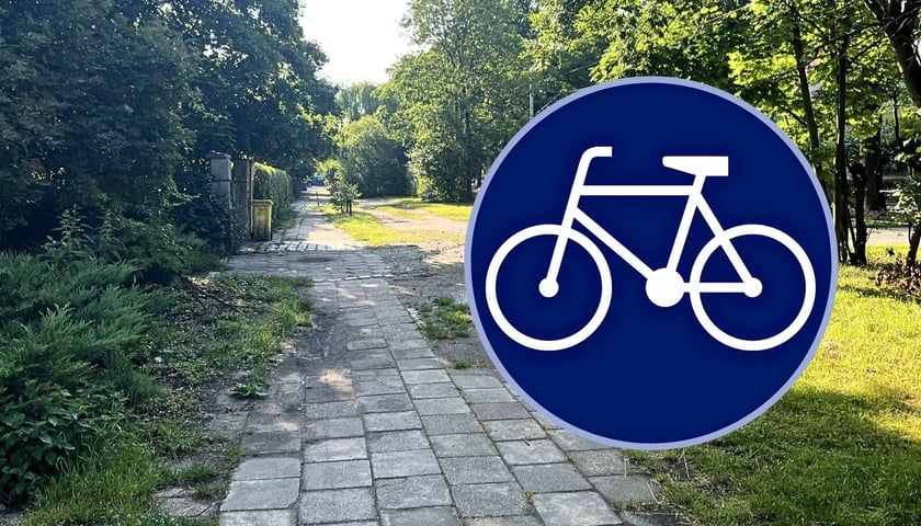 Ulica Olszewskiego i miejsce, w którym przebiegać będzie droga rowerowa. W kółku znak "droga rowerowa"