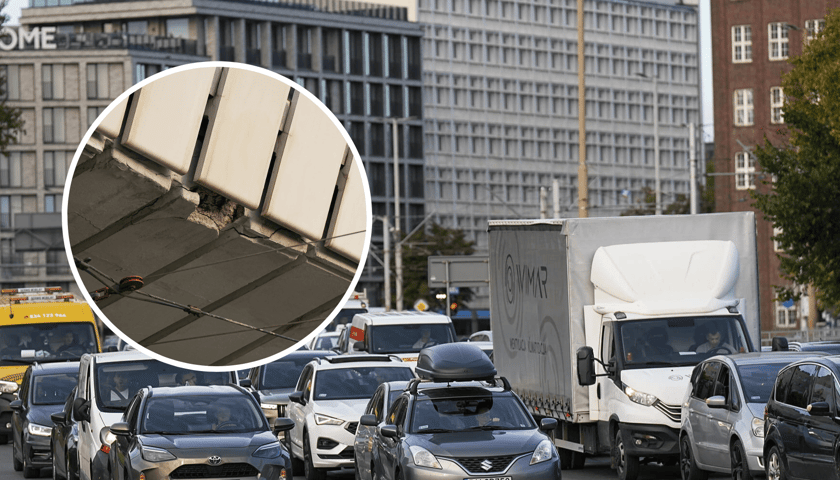 Samochody na placu Społecznym, w kółku uszkodzony fragment estakady