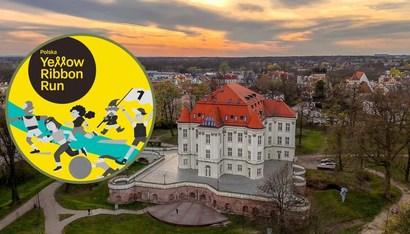 na zdjęciu  OPT Zamek w Leśnicy, w kółeczku logo Yellow Ribbon Run