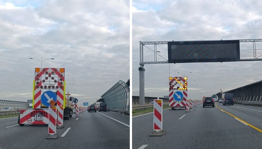 Ekipa remontowa na AOW. Jadące samochody