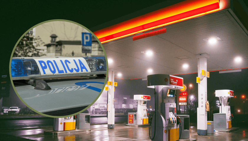 Stacja benzynowa nocą, w kółku światła radiowozu/zdjęcie poglądowe