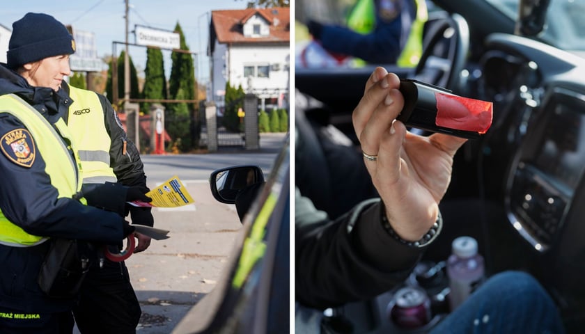 Strażniczka miejska w mundurze daje kierowcy ulotkę, mężczyzna trzyma w ręku zaklejoną taśmą kamerę. Na parking wojskowy przy cmentarzu Osobowickim tylko bez kamer samochodowych