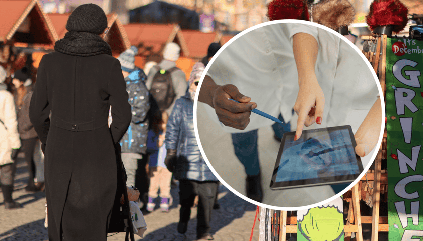 Jarmark Bożonarodzeniowy, w kółku dłonie ludzi trzymające tablet