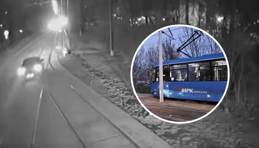 W tle kadr z filmu z monitoringu MPK Wrocław, widać m.in. samochód na torowisku, w kółku z prawej tramwaj (ilustracyjne)