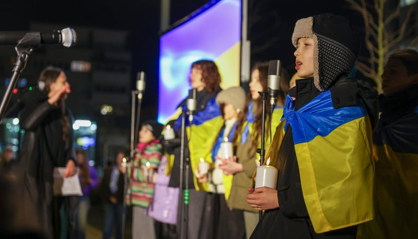 <p>Uroczystości w czwarą rocznicę wybuchu wojny w Ukrainie, na Pl. Nowy Targ we Wrocławiu</p>