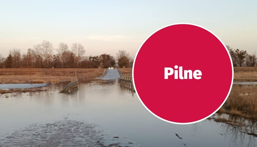 Zalana ul. Ludowa, napis pilne na czerwonym tle, 27.02.2026 r.