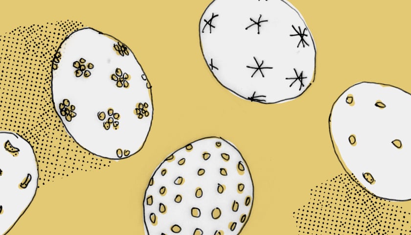 Pisanki wielkanocne na żółtym tle. Grafika ilustracyjna