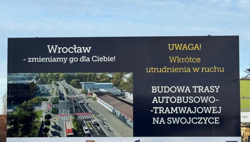 Tablica z informacją o budowie TAT na Swojczyce