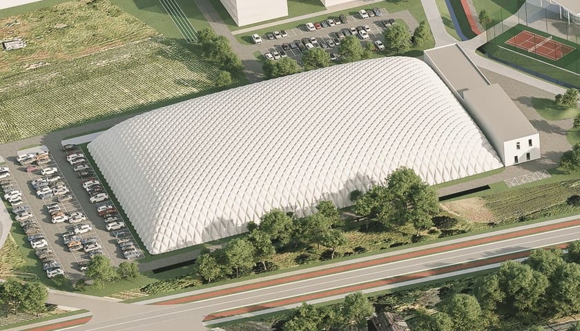 Powiększ obraz: <p>I etap Wrocławskiego Centrum Sportu - kryte boisko piłkarskie. Wizualizacja z 2024 roku.</p>
