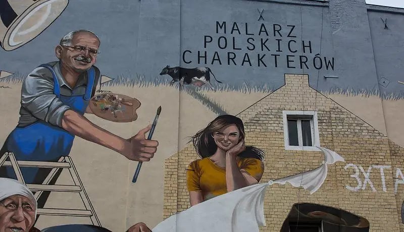 Sylwester Chęciński jako malarz polskich charakterów na muralu przy ul. Hubskiej we Wrocławiu