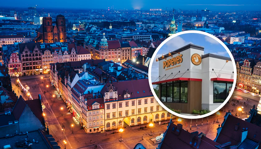 Panorama Wrocławia i logo Popeyes. Pierwsze w Polsce restauracja Popeyes otworzy się we Wrocławiu. 
