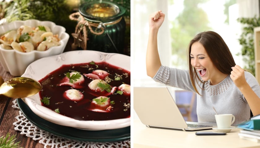 Na stole talerz z barszczem i uszkami, obok uśmiechnięta kobieta z podniesionymi rękoma siedzi przy stole i patrzy na laptopa. Zdjęcie ilustracyjne 