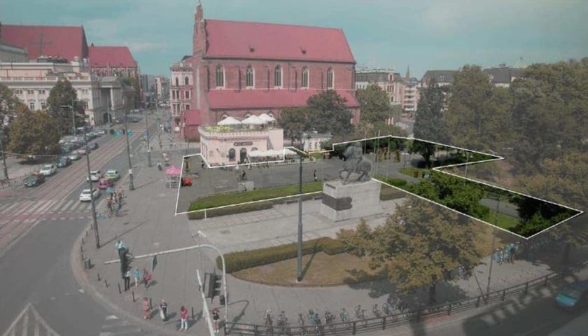 Plac koło pomnika Bolesława Chrobrego, z zaznaczonym obszarem, kt&oacute;ry ma zostać rozszczelniony i zazieleniony. Widok z drona